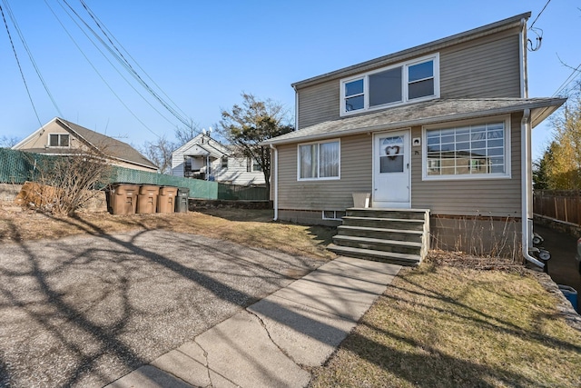 14 Overlook Pl, Stamford, CT 06907 - view of front of property featuring entry steps, fence, and roof with shingles