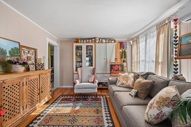 14 Overlook Pl, Stamford, CT 06907 - living room with light wood finished floors, ornamental molding, and a wall unit AC