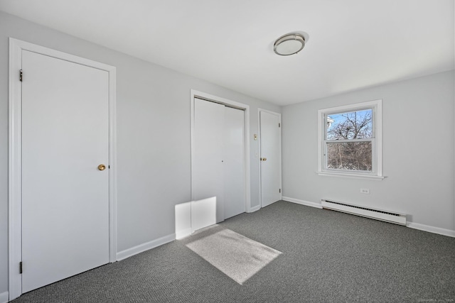 14 Overlook Pl, Stamford, CT 06907 - unfurnished bedroom featuring a closet, carpet floors, baseboards, and a baseboard radiator