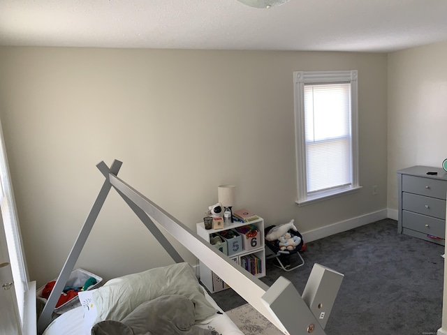 17 Easton St, Hamden, CT 06514 - bedroom with dark colored carpet and baseboards