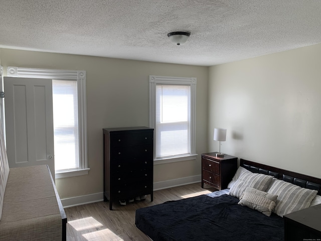 17 Easton St, Hamden, CT 06514 - bedroom featuring wood finished floors, baseboards, and a textured ceiling