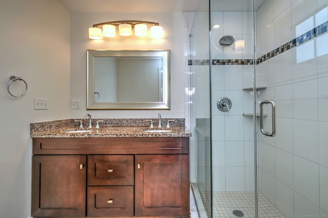 36 Deerfield Ave, Milford, CT 06460 - full bathroom with double vanity, a sink, and a stall shower