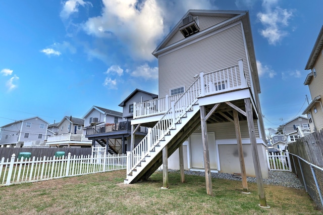 36 Deerfield Ave, Milford, CT 06460 - rear view of house featuring a wooden deck, a fenced backyard, stairs, a lawn, and a residential view