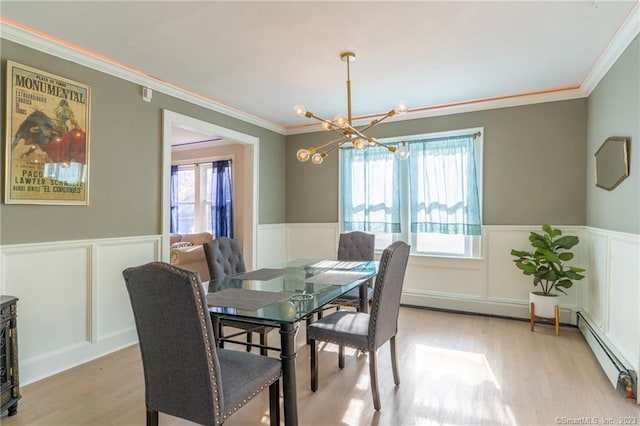 18 Fenway St, Stamford, CT 06902 - dining area featuring crown molding, an inviting chandelier, wainscoting, and light wood finished floors