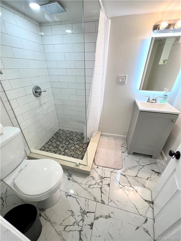 18 Fenway St, Stamford, CT 06902 - bathroom featuring vanity, baseboards, a stall shower, toilet, and marble finish floor
