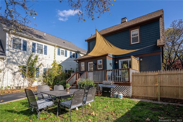 18 Fenway St, Stamford, CT 06902 - rear view of property featuring a yard, a chimney, and fence