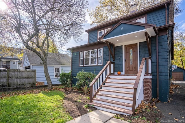 18 Fenway St, Stamford, CT 06902 - view of front of property with fence