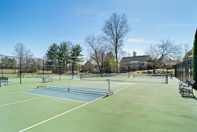 view of sport court with community basketball court and fence