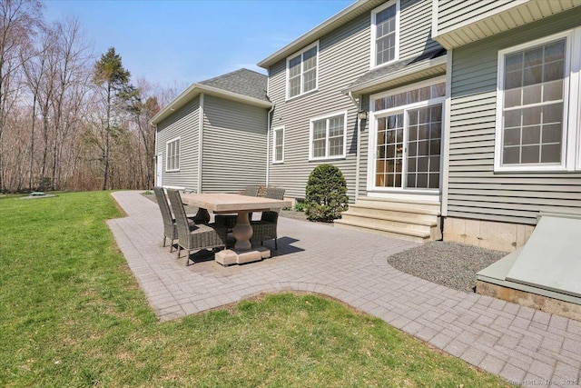view of patio / terrace featuring entry steps and outdoor dining space