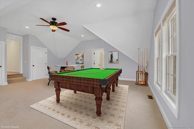 rec room with lofted ceiling, baseboards, visible vents, and carpet