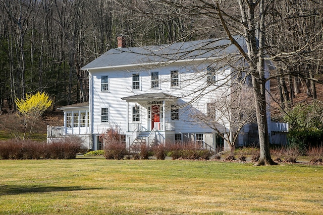 11 Hodge Rd, Roxbury, CT 06783 - colonial house featuring a chimney and a front lawn