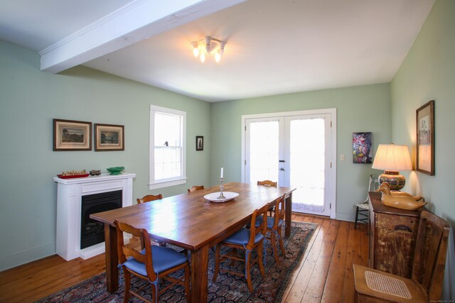 11 Hodge Rd, Roxbury, CT 06783 - dining space with hardwood / wood-style floors, french doors, a fireplace, and baseboards
