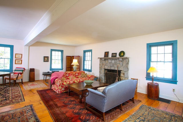 11 Hodge Rd, Roxbury, CT 06783 - living room with light wood-style flooring, a fireplace, and baseboards