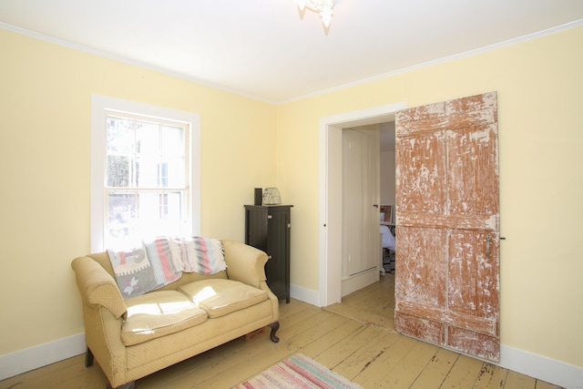 11 Hodge Rd, Roxbury, CT 06783 - sitting room with ornamental molding, wood-type flooring, and baseboards