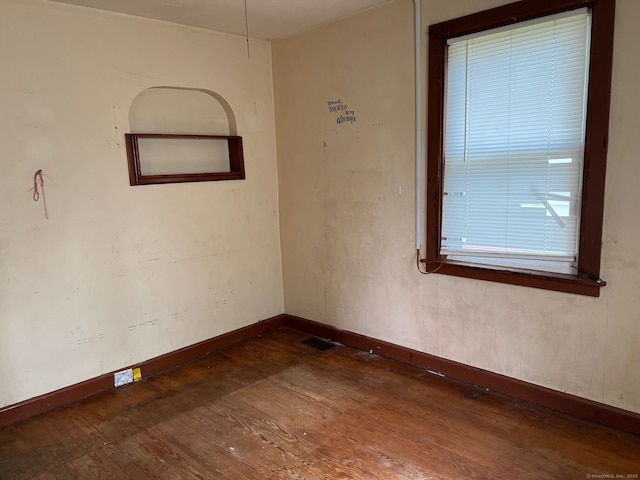 241 Harwinton Ave, Torrington, CT 06790 - unfurnished room featuring wood finished floors and baseboards