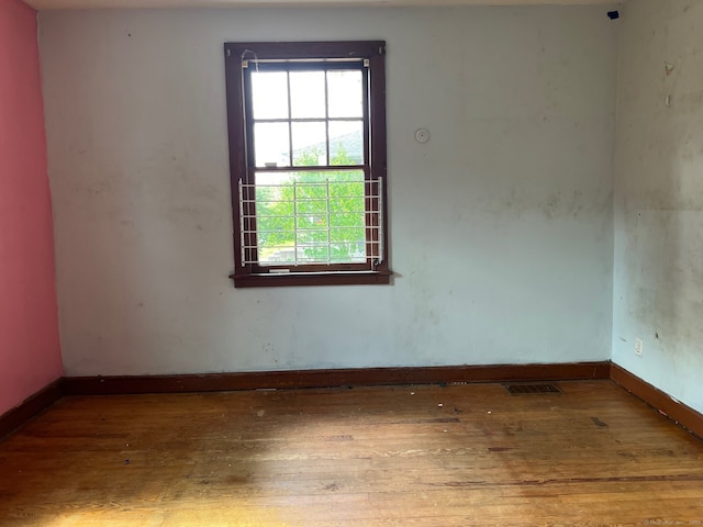 241 Harwinton Ave, Torrington, CT 06790 - empty room featuring hardwood / wood-style floors and baseboards