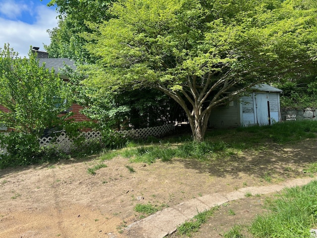 241 Harwinton Ave, Torrington, CT 06790 - view of yard with a storage shed and an outbuilding