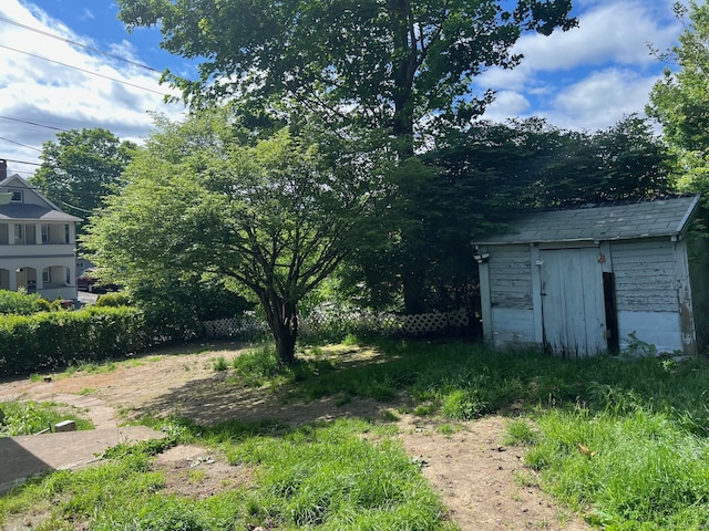 241 Harwinton Ave, Torrington, CT 06790 - view of yard with a storage shed and an outdoor structure
