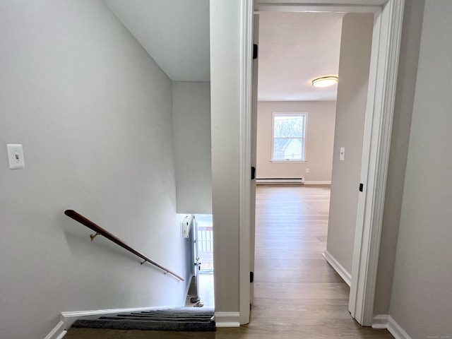 200 Yale St Unit 15B, Waterbury, CT 06704 - stairway featuring wood finished floors, baseboards, and a baseboard radiator