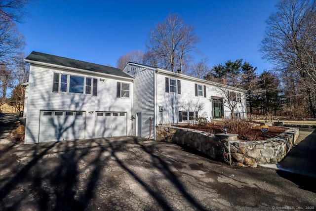 25 Jefferson Dr, New Milford, CT 06776 - view of front of home with driveway and a garage