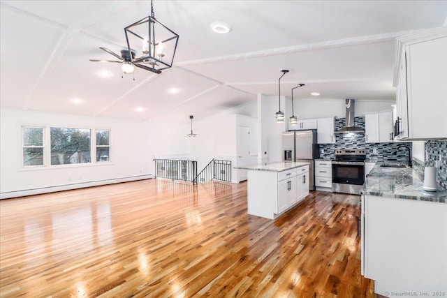 25 Jefferson Dr, New Milford, CT 06776 - kitchen with wall chimney range hood, a sink, lofted ceiling with beams, appliances with stainless steel finishes, and baseboard heating