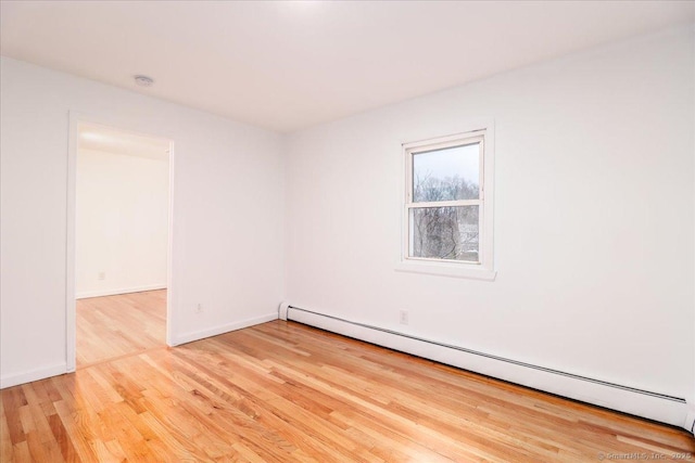 25 Jefferson Dr, New Milford, CT 06776 - unfurnished room featuring baseboard heating, baseboards, and wood finished floors