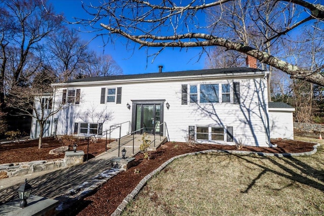 25 Jefferson Dr, New Milford, CT 06776 - split foyer home featuring a chimney and a front lawn
