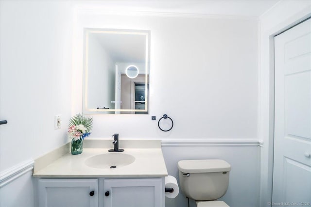 25 Jefferson Dr, New Milford, CT 06776 - half bath featuring vanity, ornamental molding, and toilet