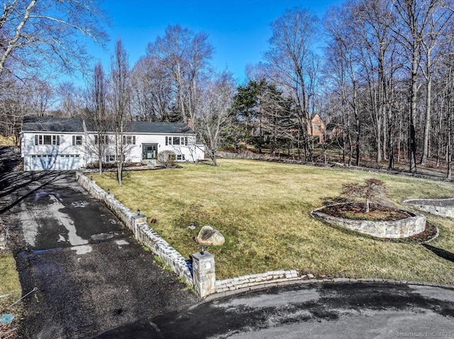 25 Jefferson Dr, New Milford, CT 06776 - exterior space with aphalt driveway and a garage