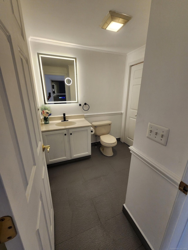 25 Jefferson Dr, New Milford, CT 06776 - bathroom featuring toilet, ornamental molding, and vanity