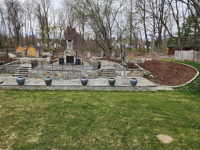 25 Jefferson Dr, New Milford, CT 06776 - view of yard with a stone fireplace, fence, and a patio area