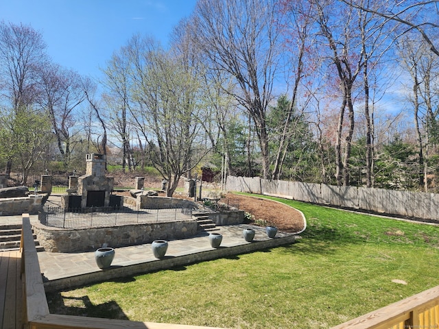 25 Jefferson Dr, New Milford, CT 06776 - view of yard with a patio area, fence, and an outdoor stone fireplace