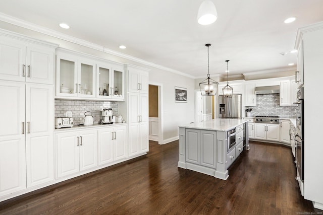 250 Valley Stream Ln, Southbury, CT 06488 - kitchen featuring stainless steel appliances, tasteful backsplash, white cabinetry, dark wood finished floors, and crown molding