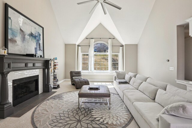 250 Valley Stream Ln, Southbury, CT 06488 - carpeted living area with a fireplace, ceiling fan, baseboards, and lofted ceiling
