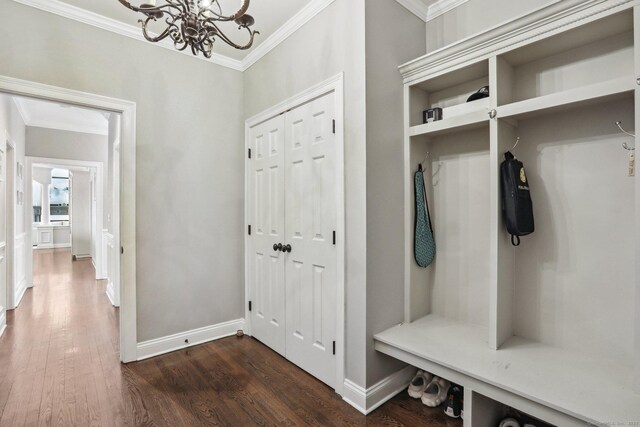 250 Valley Stream Ln, Southbury, CT 06488 - mudroom featuring ornamental molding, a chandelier, dark wood-style flooring, and baseboards