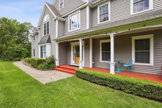 250 Valley Stream Ln, Southbury, CT 06488 - view of exterior entry featuring a lawn and covered porch