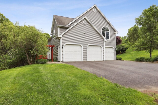 250 Valley Stream Ln, Southbury, CT 06488 - view of home's exterior with driveway, a lawn, and a garage