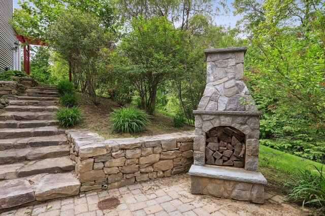 250 Valley Stream Ln, Southbury, CT 06488 - view of patio / terrace with an outdoor stone fireplace