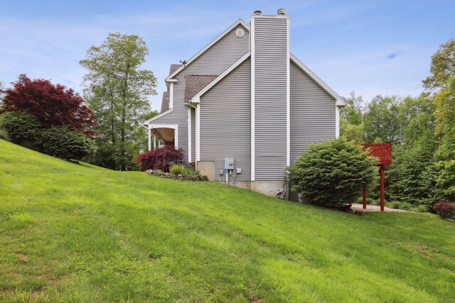 250 Valley Stream Ln, Southbury, CT 06488 - view of side of home with a yard and a chimney