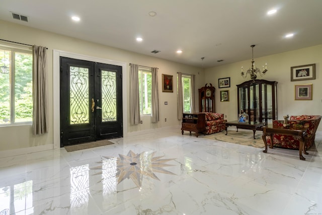 8 Tom Rd, East Haddam, CT 06423 - foyer entrance with french doors, plenty of natural light, recessed lighting, and light marble finish floors