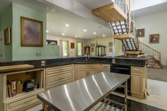 8 Tom Rd, East Haddam, CT 06423 - kitchen with black dishwasher, cream cabinetry, recessed lighting, stainless steel counters, and a peninsula