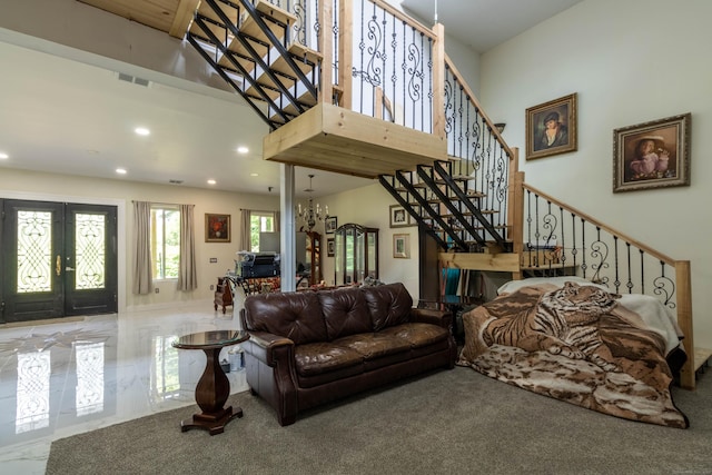 8 Tom Rd, East Haddam, CT 06423 - living area with french doors, stairs, recessed lighting, a towering ceiling, and a chandelier