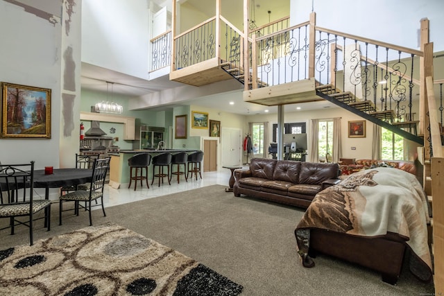 8 Tom Rd, East Haddam, CT 06423 - living area featuring a towering ceiling, stairs, and recessed lighting