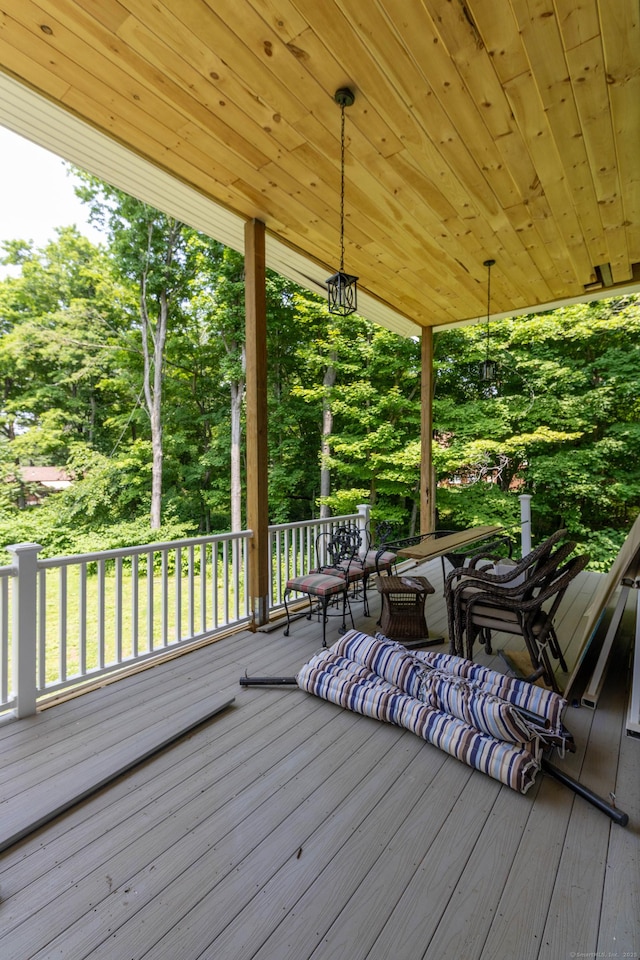8 Tom Rd, East Haddam, CT 06423 - deck with view of wooded area and an outdoor hangout area