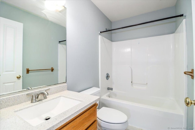full bathroom with shower / bath combination, toilet, and vanity