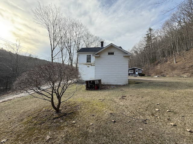 226 Greenwoods Rd W, Norfolk, CT 06058 - view of home's exterior featuring a chimney