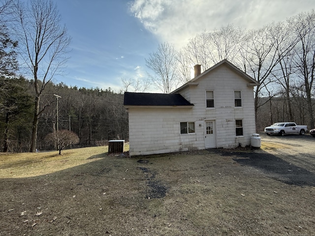 226 Greenwoods Rd W, Norfolk, CT 06058 - view of front of property featuring central air condition unit and a chimney