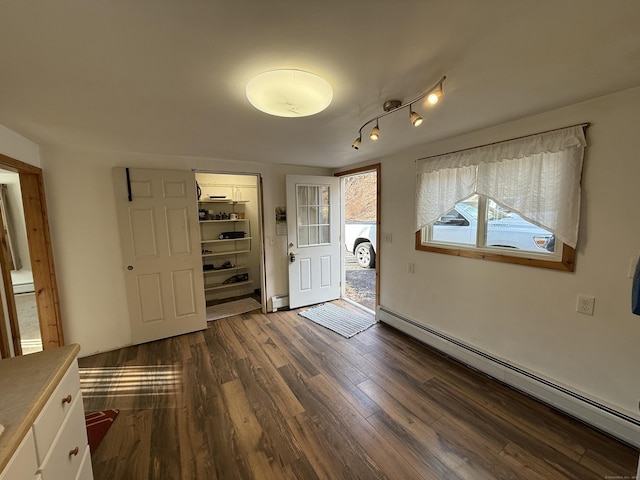 226 Greenwoods Rd W, Norfolk, CT 06058 - foyer with a baseboard radiator, baseboard heating, and dark wood-style flooring