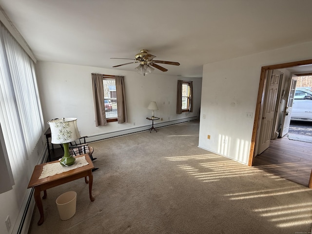 226 Greenwoods Rd W, Norfolk, CT 06058 - living area with a baseboard heating unit, carpet, and ceiling fan
