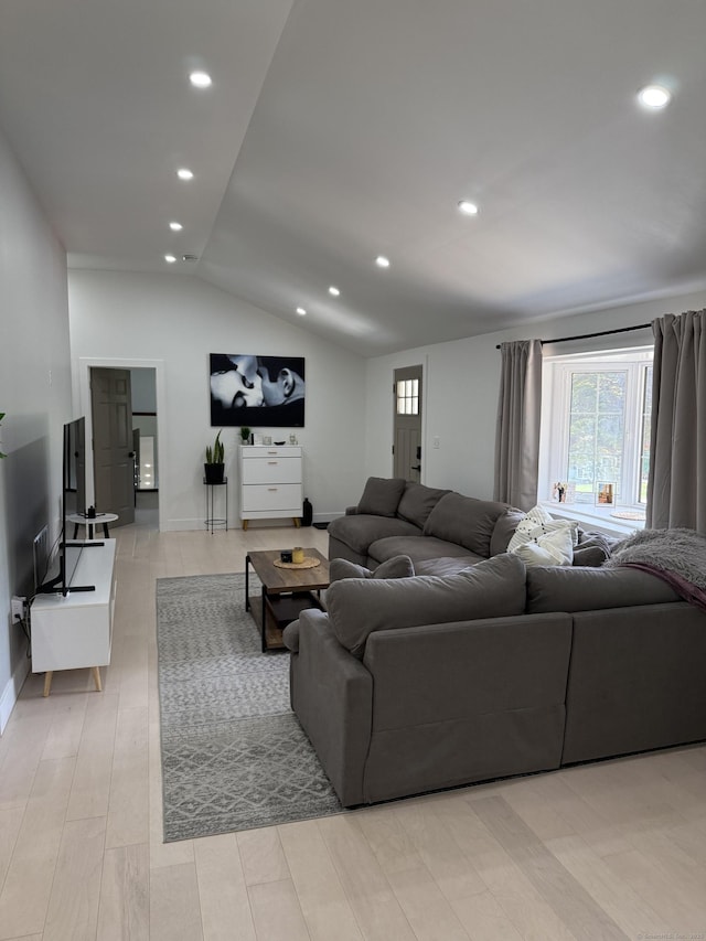 8 Hubbard Rd, North Branford, CT 06471 - living room with vaulted ceiling, recessed lighting, wood finished floors, and baseboards